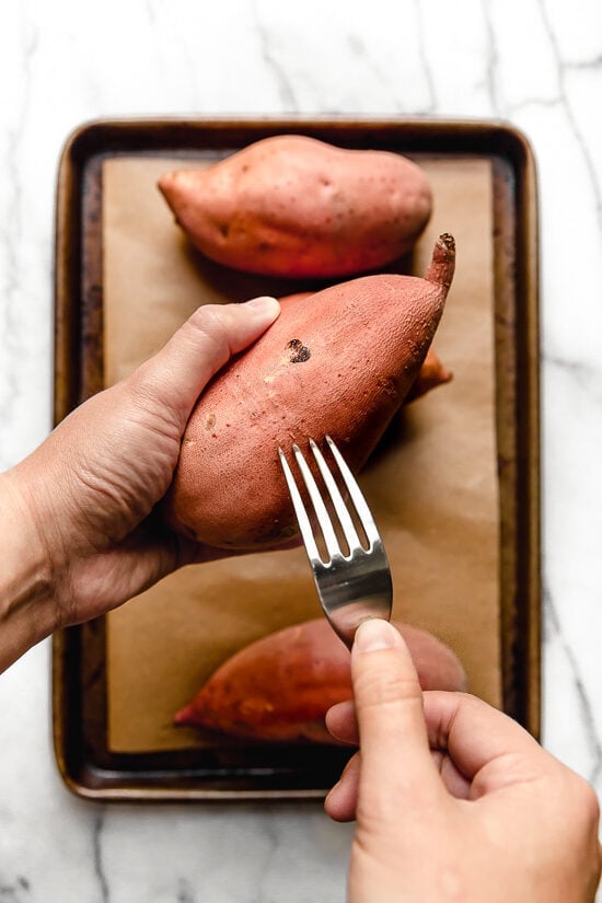 Sweet Potatoes with fork