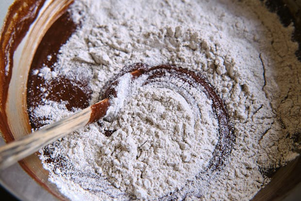 Flour being mixed into a brownie batter