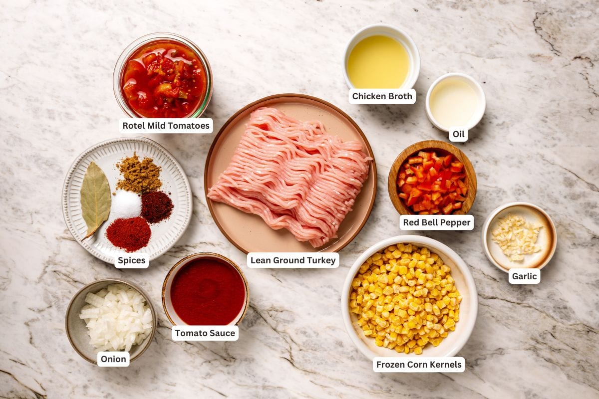 Kid-friendly ingredients for crock pot turkey chili with text labels.